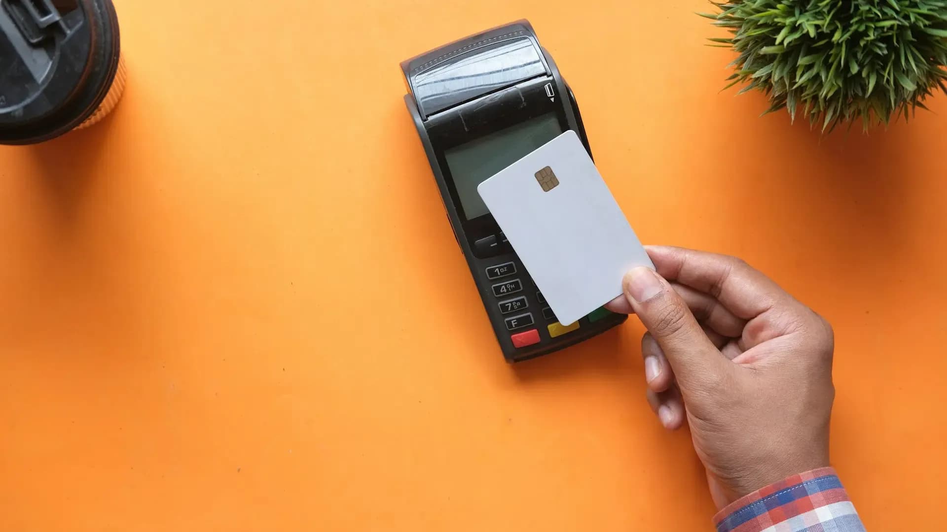 Guest paying by card at the counter